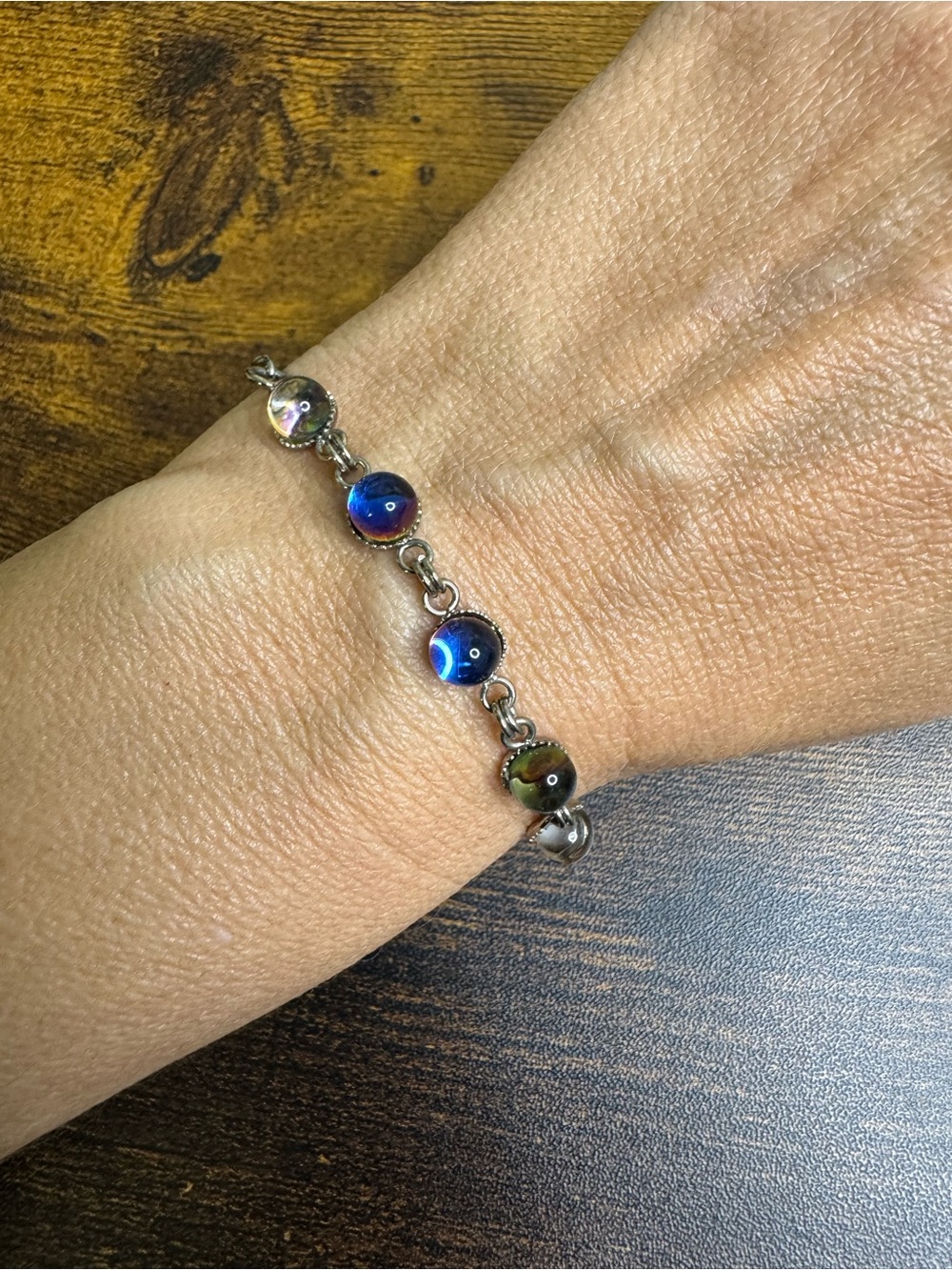 Silver Bracelet with Iridescent Blue-Green Glass Beads
